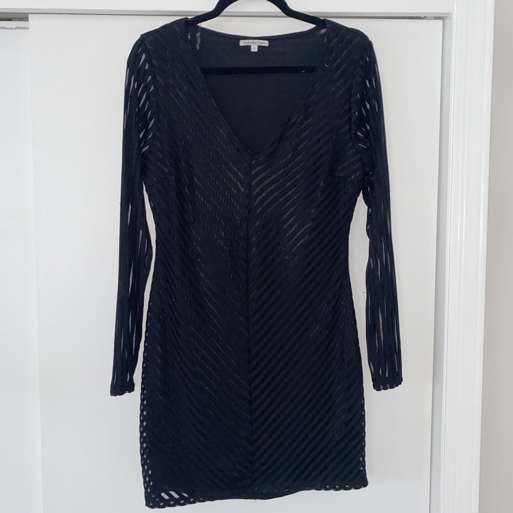 Black long sleeve cocktail dress.